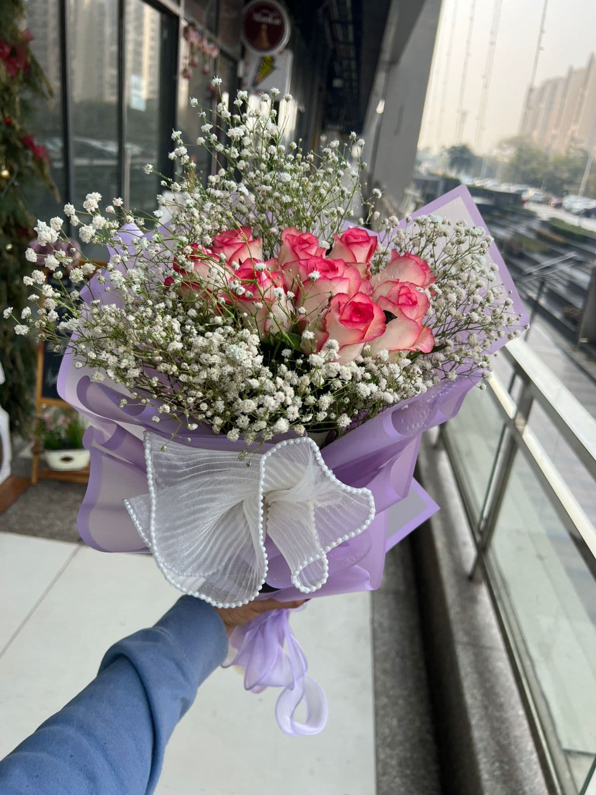Pink rose baby breath bouquet